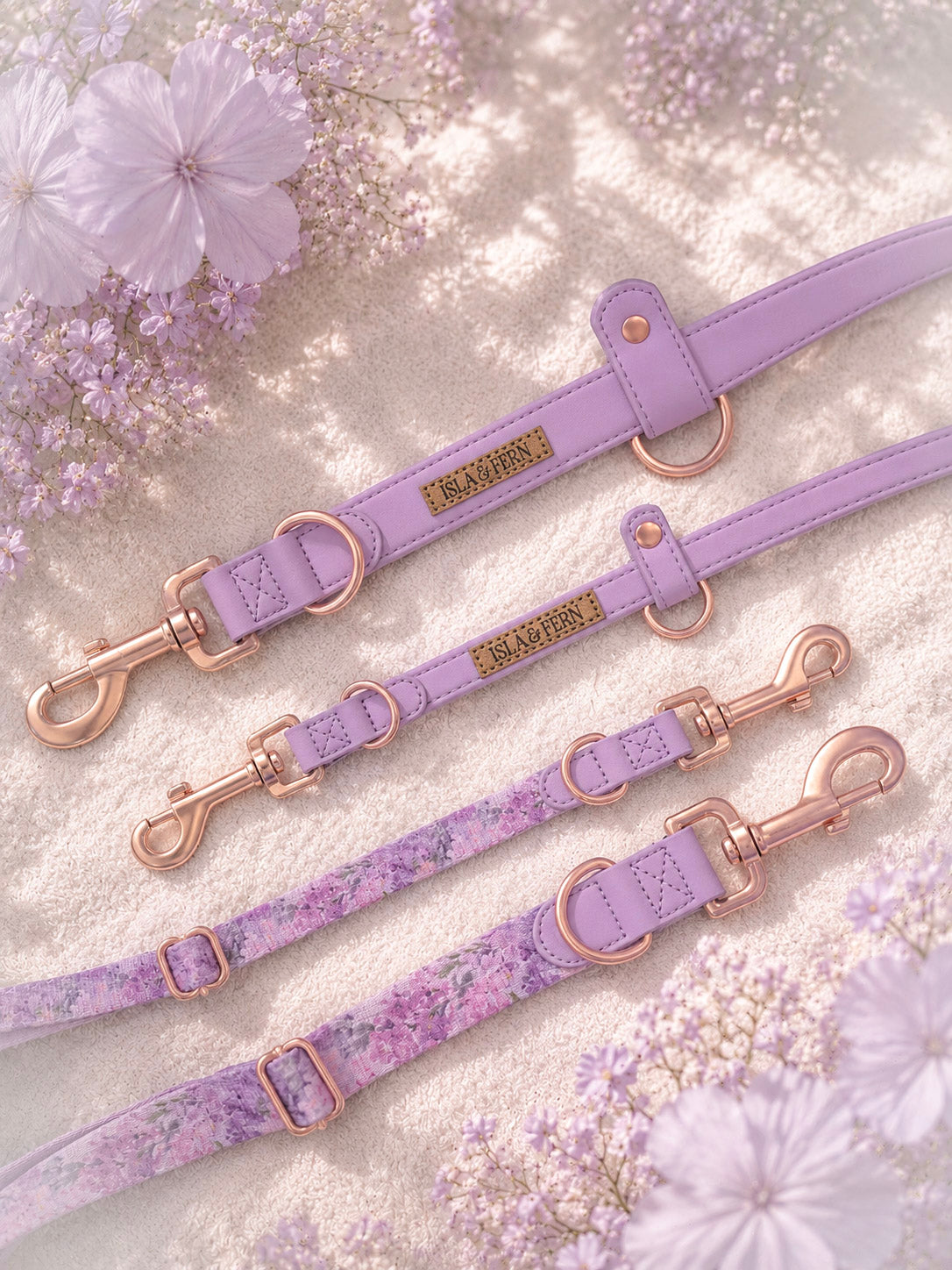 Isla and Fern Hybrid Verso leash with rose gold hardware and a floral print, and vegan lilac leather 